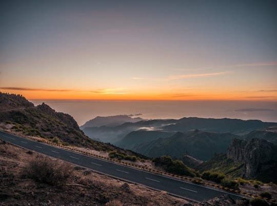 black asphalt road near mountains during sunset in Pico do Arieiro Portugal