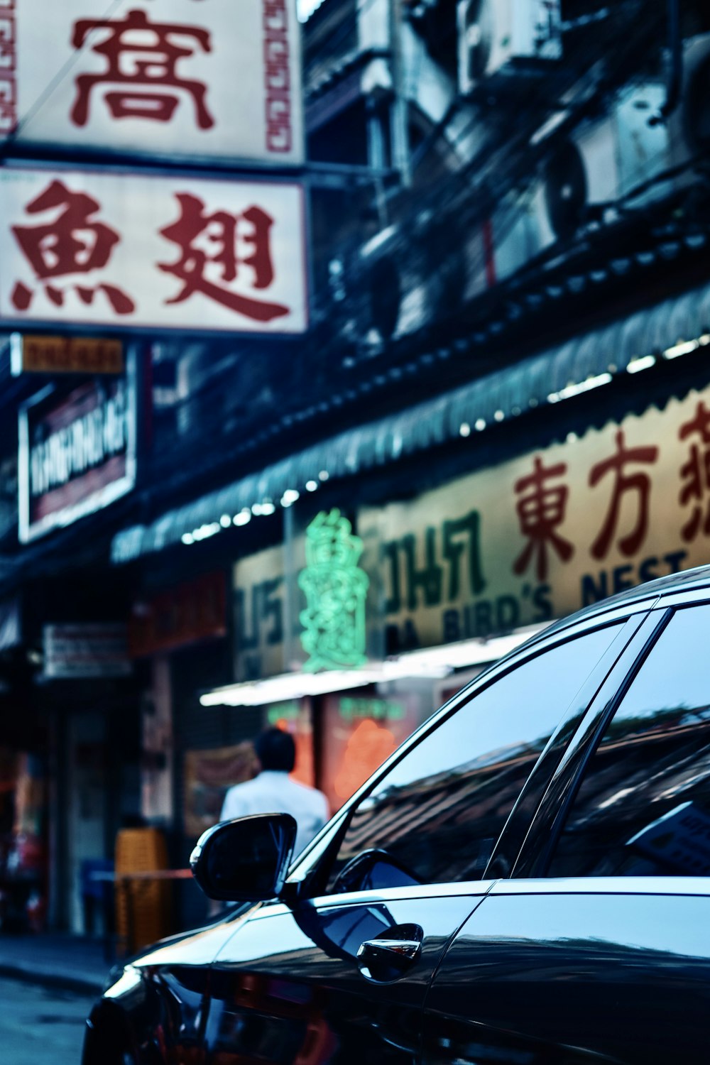 black car on the street during daytime