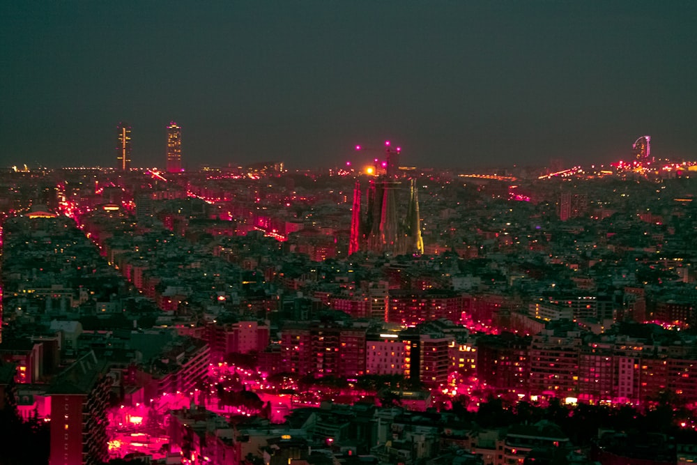 city with high rise buildings during night time