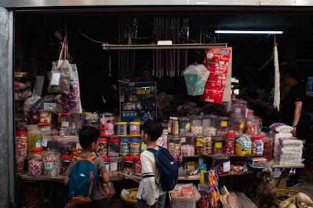 A cozy corner of Shu Shu Guan store showcasing traditional Chinese stationery and toys.