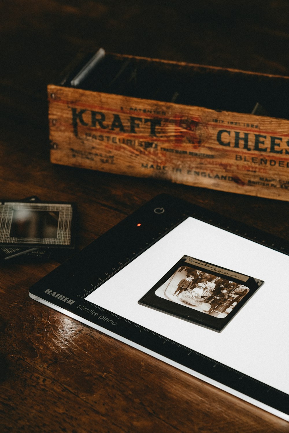 black and white box on brown wooden table