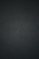 black textile in close up photography