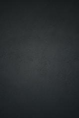 black textile in close up photography