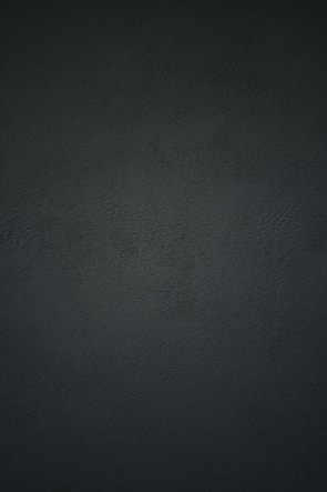 black textile in close up photography