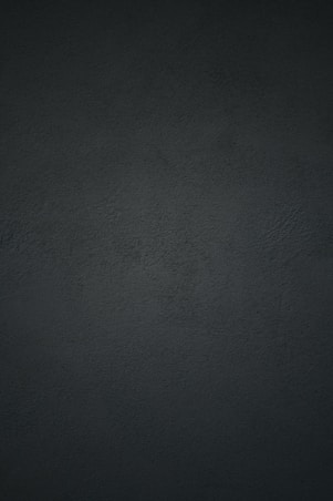 black textile in close up photography