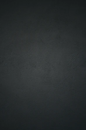 black textile in close up photography