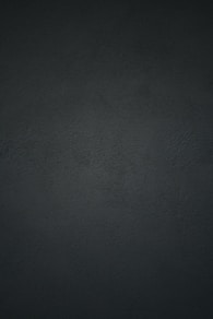 black textile in close up photography