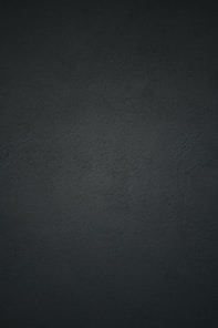 black textile in close up photography