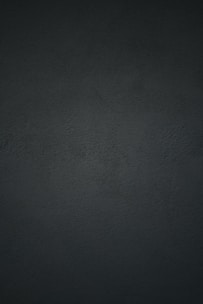 black textile in close up photography