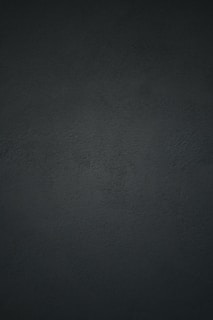 black textile in close up photography