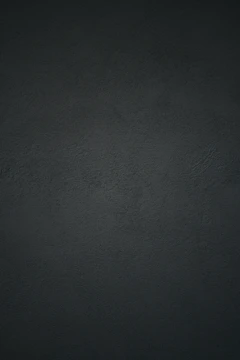 dark textured plaster wall