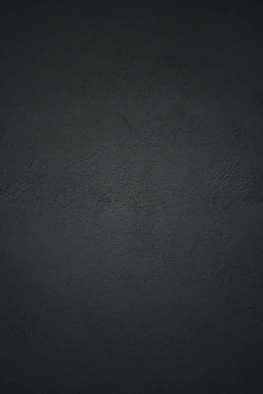 dark textured plaster wall