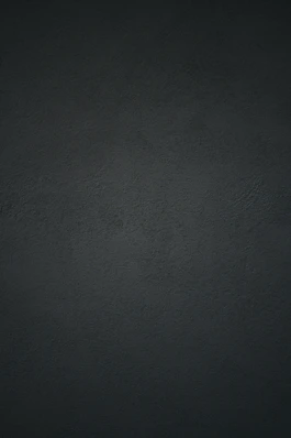 dark textured plaster wall