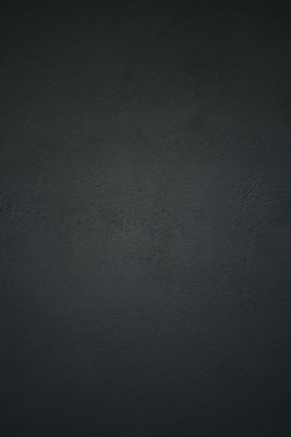 black textile in close up photography