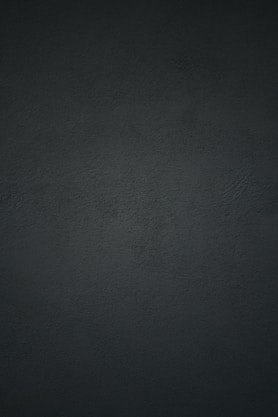 black textile in close up photography