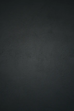 dark textured plaster wall