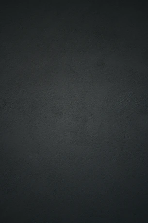 dark textured plaster wall