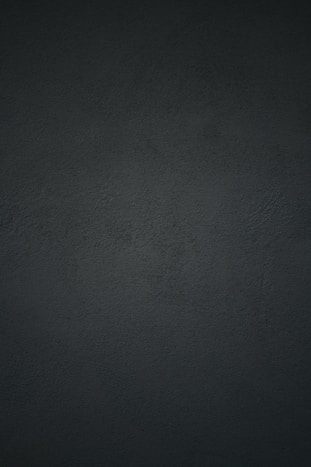 black textile in close up photography