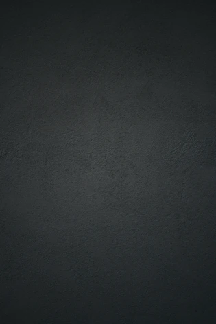 dark textured plaster wall