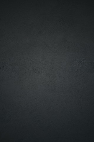 black textile in close up photography