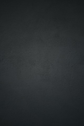 black textile in close up photography