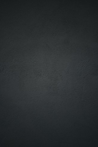 black textile in close up photography