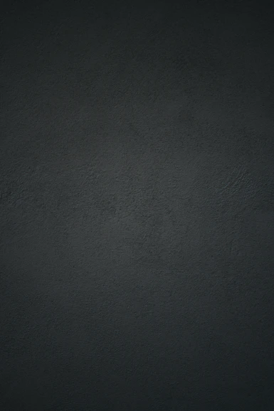 dark textured plaster wall