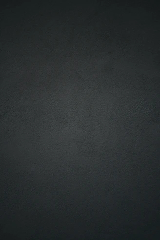 dark textured plaster wall