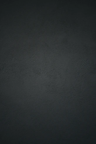 dark textured plaster wall