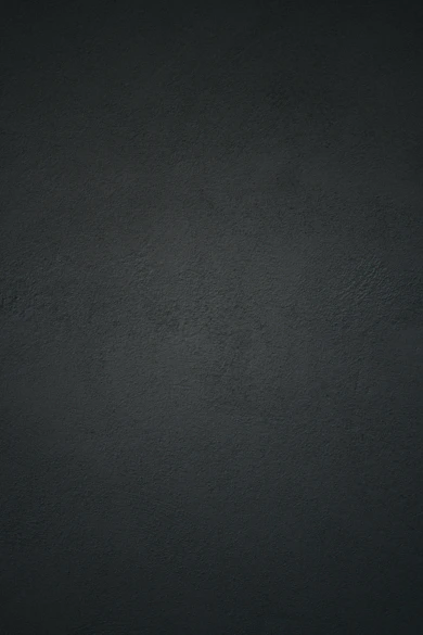 dark textured plaster wall
