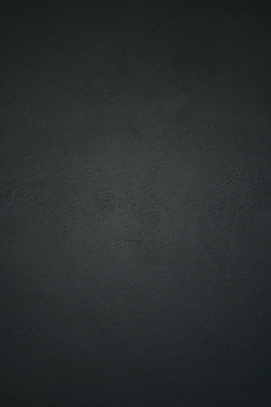dark textured plaster wall