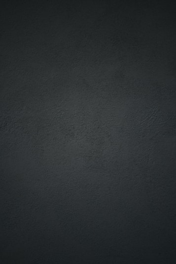 black textile in close up photography