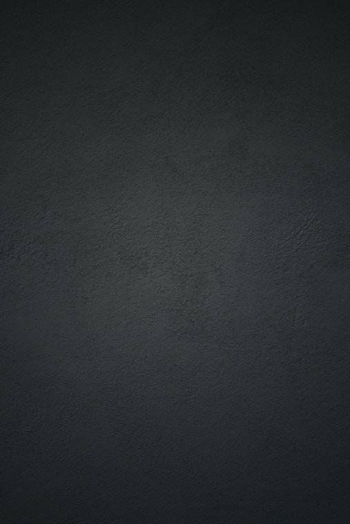 black textile in close up photography