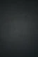 dark textured plaster wall