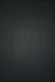 dark textured plaster wall