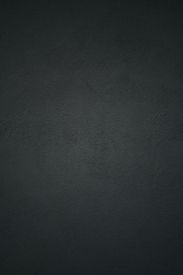 dark textured plaster wall