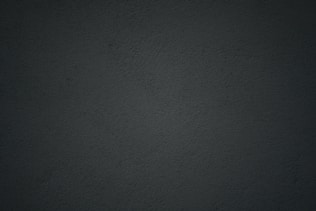 black textile in close up photography