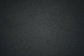 black textile in close up photography