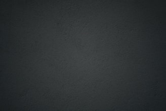 black textile in close up photography