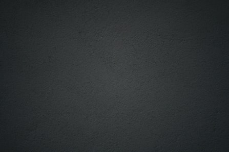 black textile in close up photography