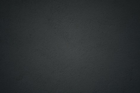 black textile in close up photography