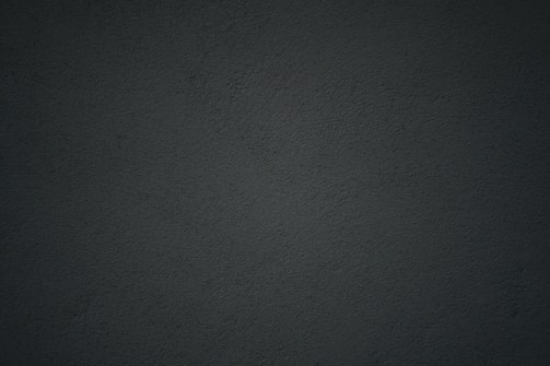 black textile in close up photography