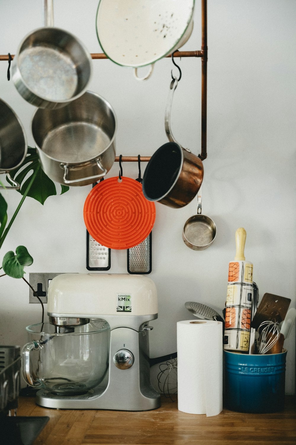 stainless steel cooking pot on white stove