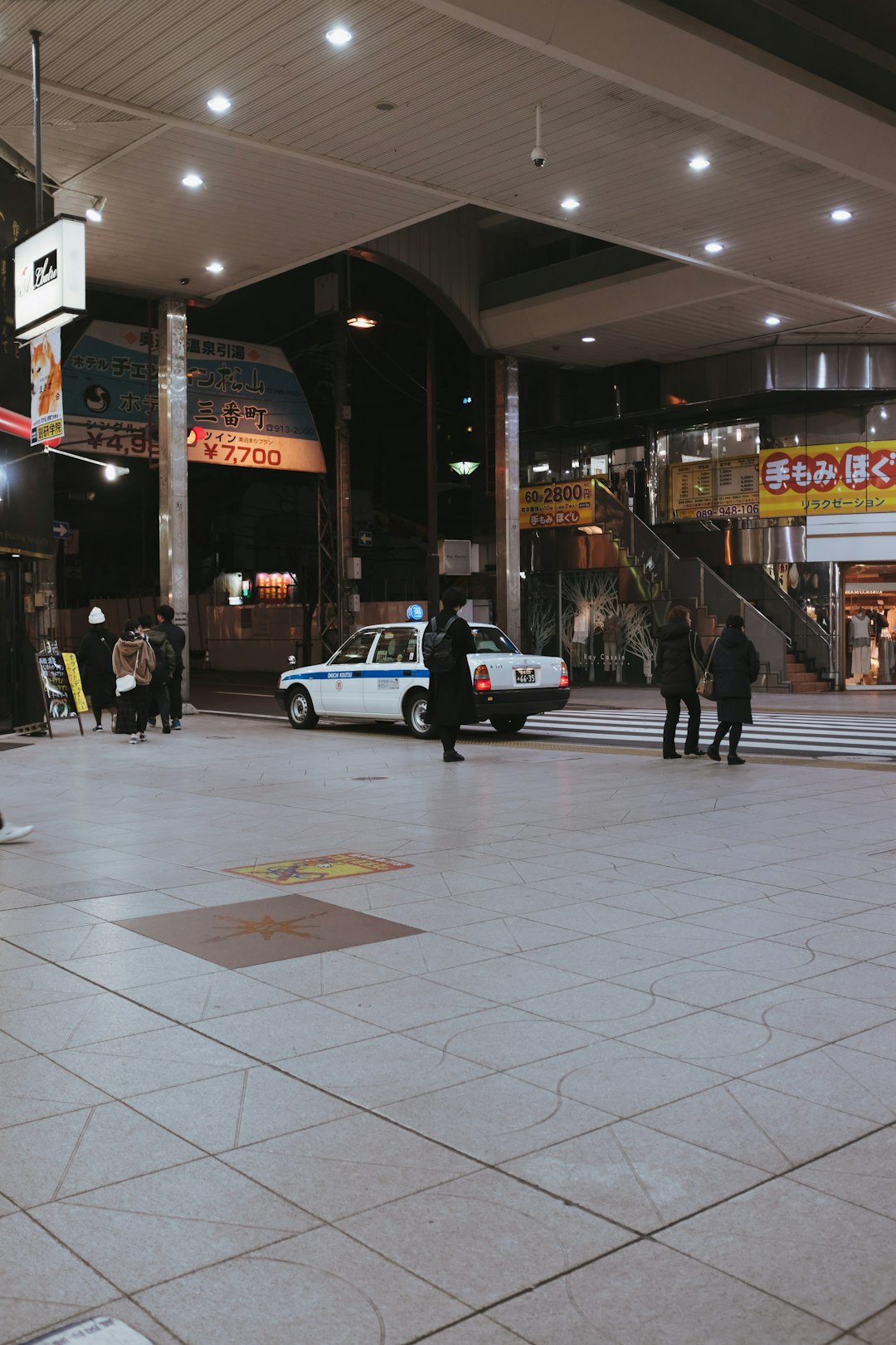 white and black car on road during nighttime