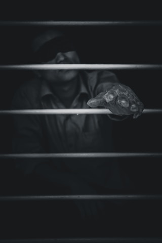 A dark-themed image depicting the struggles of Siwan district.