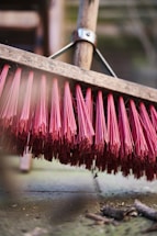 red and brown brush on white wooden table