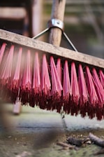 red and brown brush on white wooden table