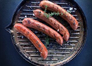 sausage on black round pan