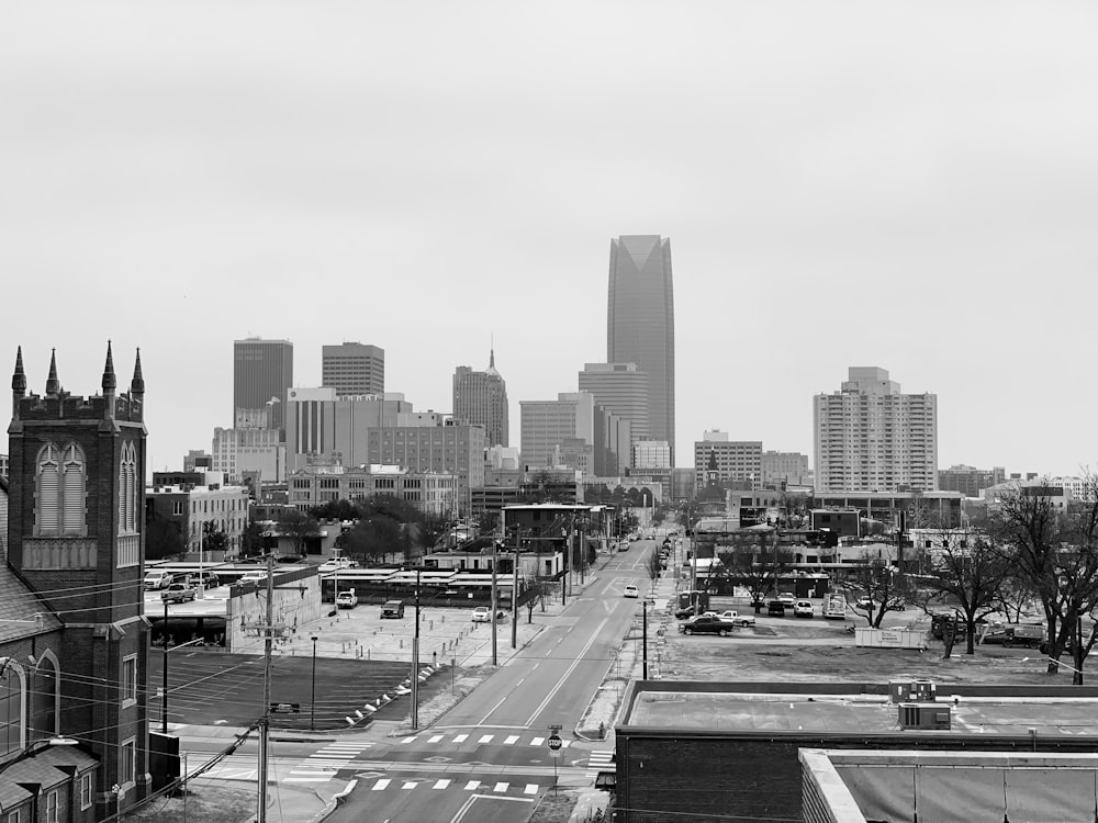 grayscale photo of city buildings