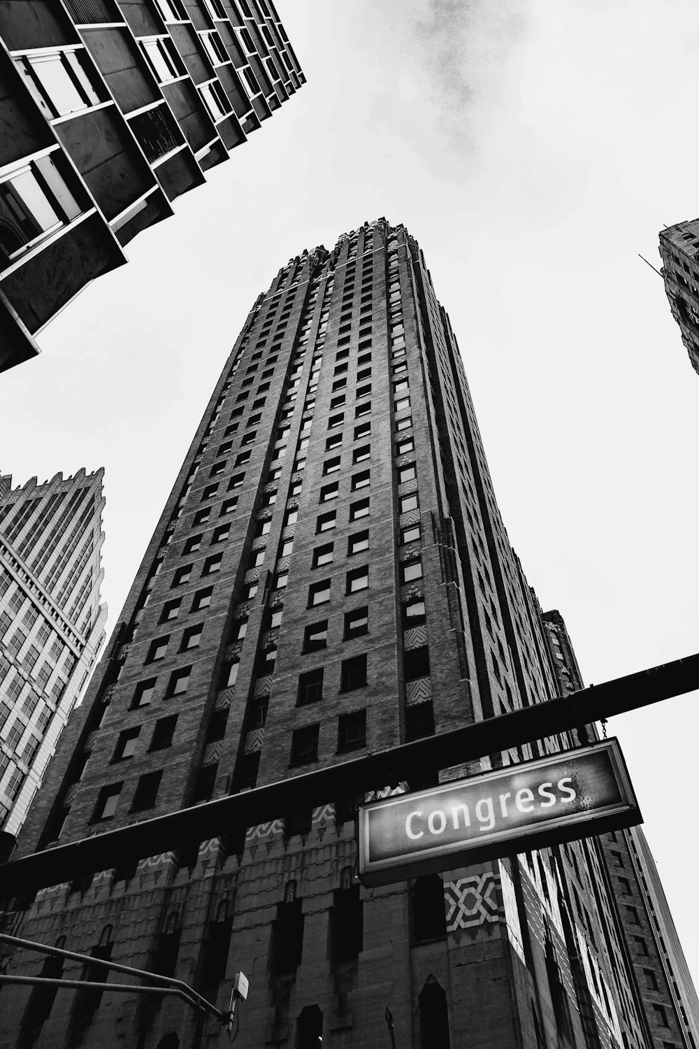 grayscale photo of high rise building